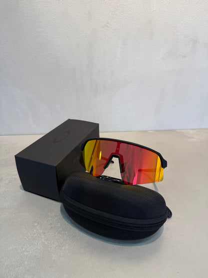 Lentes OAK negro y naranja 7196