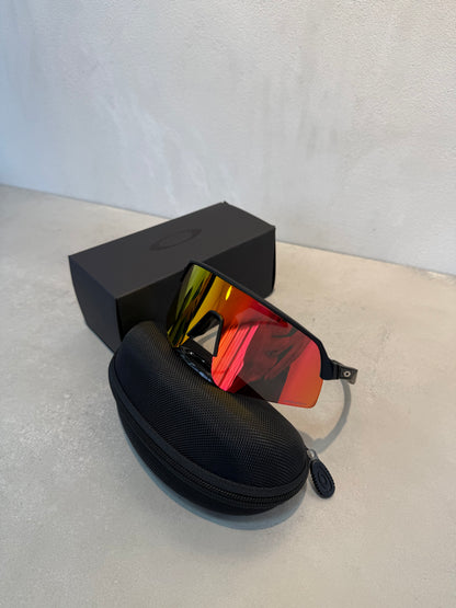 Lentes OAK negro y naranja 7196
