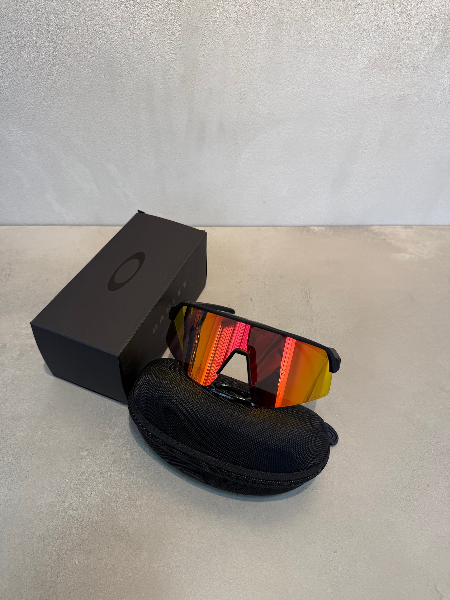 Lentes OAK negro y naranja 7196