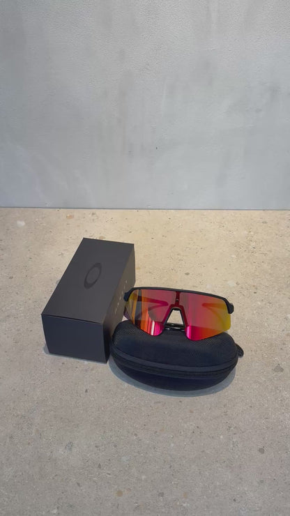 Lentes OAK negro y naranja 7196